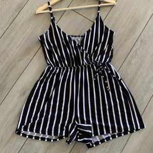 Black and white striped romper.